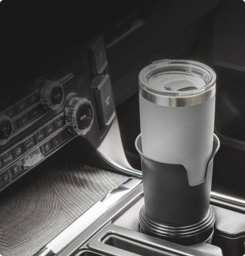 WeatherTech CupCoffee installed in a vehicle's cup holder.