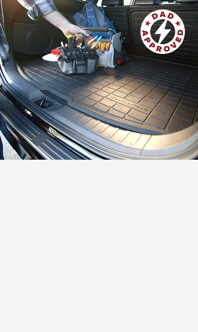 man putting tools on weathertech cargo liner