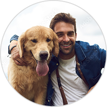man and golden retriever sharing embrace  