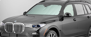 WeatherTech SunShade installed in vehicle with reflective silver side out (front view)