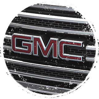 GMC logo on the grill of a GMC truck.