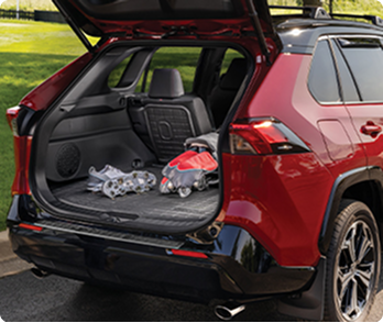 suv with trunk open and weathertech cargo seat back liner installed and golf equipment inside