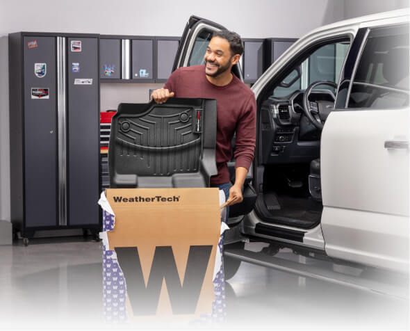 Dad opening weathertech gift