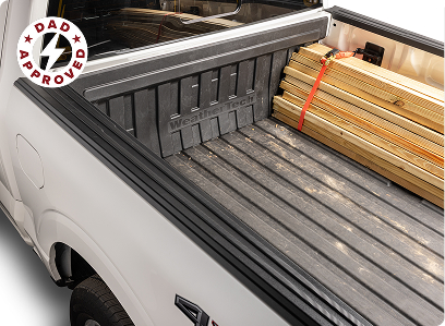 truck pick up bed with weathertech impactliner installed loaded with lumber