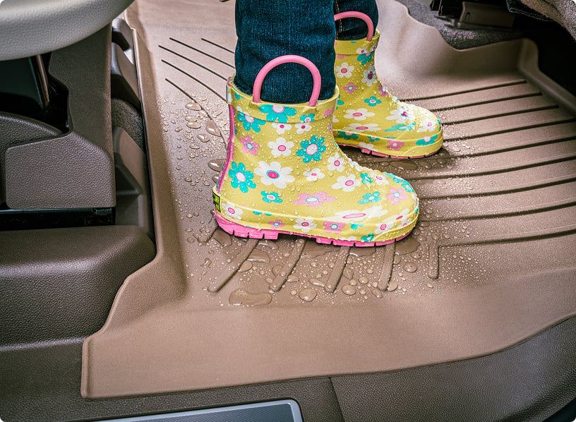 A Child's Rain Boots Atop a WeatherTech FloorLiner HP