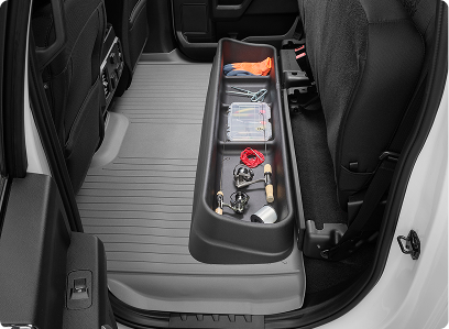 underseat storage system installed in vehicle holding fishing gear